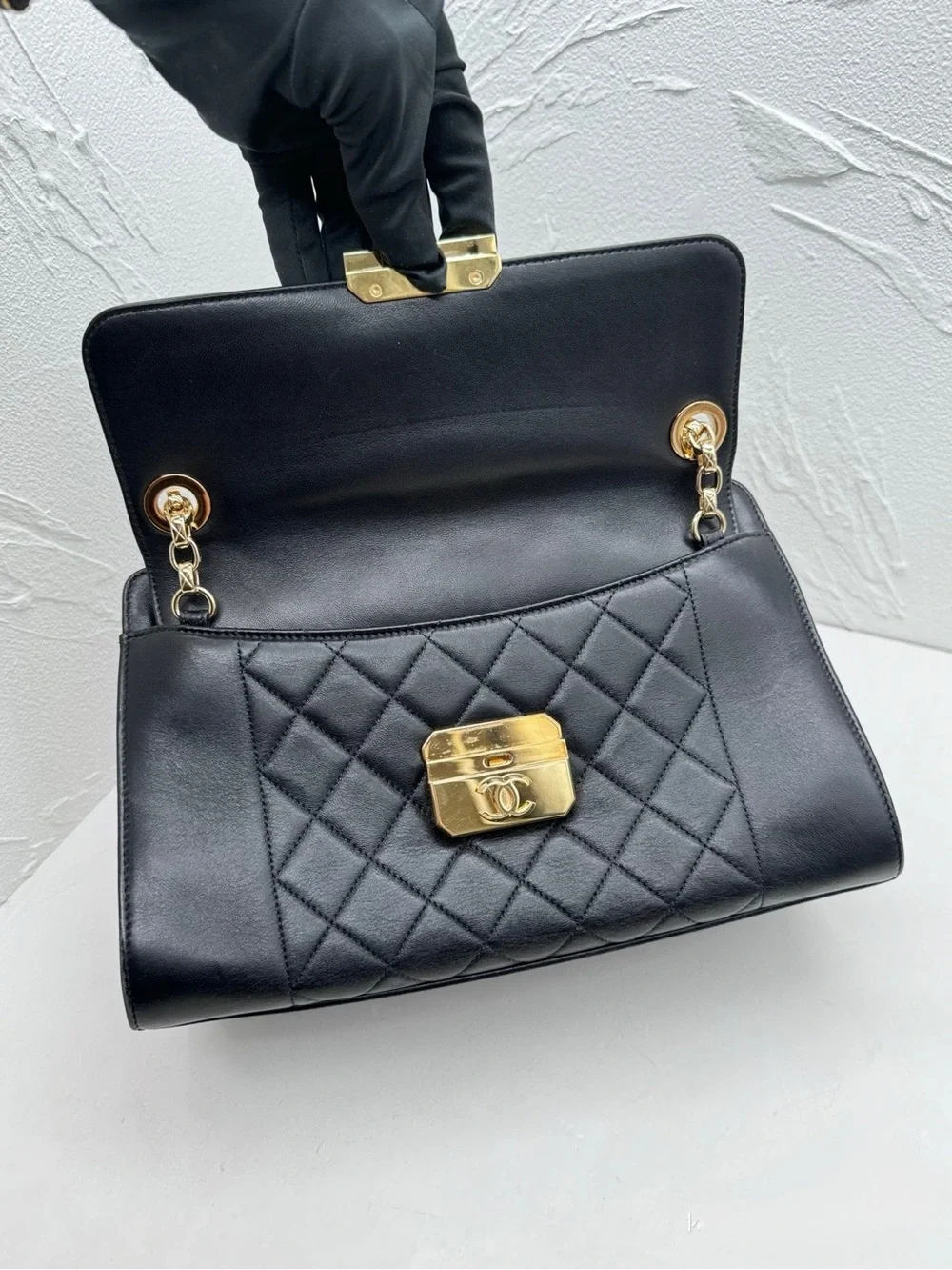 CHANEL Black Quilted Leather Shoulder Bag with Gold Hardware
